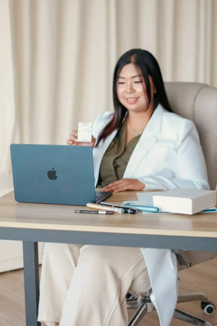 A clinician at their desk between appointments